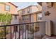 Cozy balcony with outdoor seating and a view of the neighborhood at 7807 W Palm Ln, Phoenix, AZ 85035