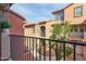 Cozy balcony with outdoor seating and a view of the neighborhood at 7807 W Palm Ln, Phoenix, AZ 85035