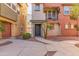 Charming townhome with a balcony and desert landscaping at 7807 W Palm Ln, Phoenix, AZ 85035