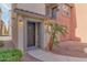 Inviting front entrance with a covered porch and desert landscaping at 7807 W Palm Ln, Phoenix, AZ 85035