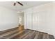 Bright, spacious bedroom with an attached bathroom and large closet at 9429 E Nacoma Dr, Sun Lakes, AZ 85248