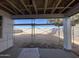 New construction backyard featuring a partially covered patio with an exposed view of the open lot at 9522 W Luxton Ln, Tolleson, AZ 85353