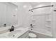 Bright bathroom featuring modern fixtures, a sleek vanity, and a shower-tub combination at 9522 W Luxton Ln, Tolleson, AZ 85353