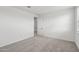 Bright bedroom with neutral carpet, white walls, and bright window at 9522 W Luxton Ln, Tolleson, AZ 85353