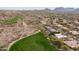 Stunning aerial view of a golf course community nestled in a desert landscape with mountains in the background at 9626 E Peak View Rd, Scottsdale, AZ 85262