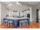 Large kitchen island features seating and modern appliances for a functional cooking space at 9626 E Peak View Rd, Scottsdale, AZ 85262