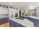 Spacious open kitchen with a large center island, modern appliances, and seamless design at 9626 E Peak View Rd, Scottsdale, AZ 85262