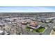 Aerial perspective of Sun City West commercial area with restaurants, shopping centers, and heavy traffic at 12814 W Shadow Hills Dr, Sun City West, AZ 85375