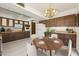 Functional eat-in kitchen with ample cabinet space, modern appliances, and a cozy dining area at 12814 W Shadow Hills Dr, Sun City West, AZ 85375
