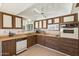 Well-maintained kitchen featuring classic cabinetry, practical layout, and essential appliances for everyday cooking at 12814 W Shadow Hills Dr, Sun City West, AZ 85375