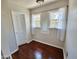 Bright bedroom with natural light featuring wood floors and white walls at 1541 W Culver St, Phoenix, AZ 85007