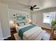 Stylishly decorated bedroom featuring an inviting bed and decorative wall art at 1541 W Culver St, Phoenix, AZ 85007