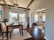 Dining area featuring hardwood floors and an archway with a view of the living room at 1541 W Culver St, Phoenix, AZ 85007