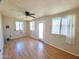 Bright and airy living room with natural light and wood laminate flooring at 1541 W Culver St, Phoenix, AZ 85007