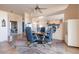 Cozy dining room with comfortable seating, a decorative rug, and stylish lighting at 16141 E Thistle Dr, Fountain Hills, AZ 85268