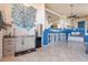 Open kitchen features stylish cabinetry, granite countertops, and unique decor at 16141 E Thistle Dr, Fountain Hills, AZ 85268