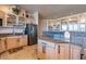 The kitchen features custom cabinetry, granite countertops, and stainless steel appliances at 16141 E Thistle Dr, Fountain Hills, AZ 85268