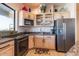 Bright kitchen with a corner sink, stainless appliances, and well organized cabinets at 16141 E Thistle Dr, Fountain Hills, AZ 85268