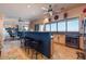 Spacious kitchen features an island with seating and mountain views from the large windows at 16141 E Thistle Dr, Fountain Hills, AZ 85268