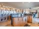 Gourmet kitchen featuring custom wood cabinetry and granite countertops at 16141 E Thistle Dr, Fountain Hills, AZ 85268