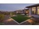 The backyard has desert landscaping with an artificial turf section at 18166 E Juniper Oaks Dr, Rio Verde, AZ 85263