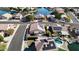 Aerial view of the neighborhood featuring single-Gathering homes with solar panels and waterfront views at 20626 N 55Th Ave, Glendale, AZ 85308