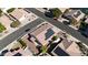 Birds-eye view of home featuring solar panels, desert landscaping, tile roof and proximity to neighborhood at 20626 N 55Th Ave, Glendale, AZ 85308