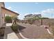 Large backyard with covered patio, gravel landscaping and block fence at 20626 N 55Th Ave, Glendale, AZ 85308