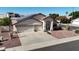 Beautiful home with a well-maintained front yard, a spacious driveway, and a two-car garage at 20626 N 55Th Ave, Glendale, AZ 85308