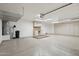 Clean, organized garage with ample storage, cabinets, and workspace at 20626 N 55Th Ave, Glendale, AZ 85308
