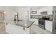 Clean kitchen highlighting granite countertops, stainless steel appliances, and white cabinetry at 20626 N 55Th Ave, Glendale, AZ 85308
