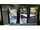 Home surveillance security system displaying live view footage of home and property at 20626 N 55Th Ave, Glendale, AZ 85308