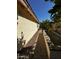 Side yard of the home features gravel landscaping with a brick path at 20626 N 55Th Ave, Glendale, AZ 85308