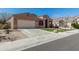 Charming single-story home with a three-car garage, desert landscaping, and inviting curb appeal at 27250 N 86Th Ave, Peoria, AZ 85383