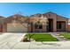 Charming single-story home with a well-manicured front yard and xeriscape at 27250 N 86Th Ave, Peoria, AZ 85383