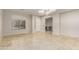 Bright and airy living room featuring travertine floors and large windows at 27250 N 86Th Ave, Peoria, AZ 85383