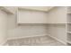 The walk-in closet is ready to be organized at 27250 N 86Th Ave, Peoria, AZ 85383