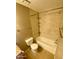 Cozy bathroom featuring a shower-tub combo with decorative tile surround at 2938 N 61St Pl # 234, Scottsdale, AZ 85251