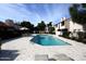 Relaxing community pool area with comfortable seating and well-manicured landscaping at 2938 N 61St Pl # 234, Scottsdale, AZ 85251