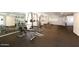 Spacious fitness center featuring modern weightlifting machines and mirrored wall for residents' health and wellness at 2938 N 61St Pl # 234, Scottsdale, AZ 85251