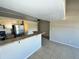 Kitchen with a breakfast bar, stainless steel refrigerator, and updated appliances at 2938 N 61St Pl # 234, Scottsdale, AZ 85251
