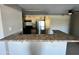 Kitchen featuring stainless steel refrigerator and breakfast bar at 2938 N 61St Pl # 234, Scottsdale, AZ 85251