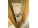Efficiently stacked washer and dryer unit neatly tucked inside a wooden cabinet at 2938 N 61St Pl # 234, Scottsdale, AZ 85251