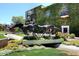 Horse statues with green walls, create a captivating outdoor feature at 2938 N 61St Pl # 234, Scottsdale, AZ 85251