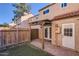 Backyard with artificial turf, a BBQ grill, and access to the home's exterior at 4525 E Rhonda Dr, Phoenix, AZ 85018