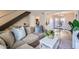 Bright living room and dining area with comfortable seating, stylish decor, and hardwood flooring at 4525 E Rhonda Dr, Phoenix, AZ 85018