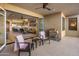 Spacious balcony with outdoor furniture, offering a seamless transition to living and kitchen area at 6166 N Scottsdale Rd # A3001, Paradise Valley, AZ 85253