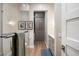 Bathroom boasts modern design with glass enclosed shower, wood floors and custom closet storage at 6166 N Scottsdale Rd # A3001, Paradise Valley, AZ 85253