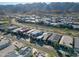 An aerial view of a neighborhood with mountain views and desert landscaping at 727 E Monte Way, Phoenix, AZ 85042