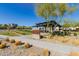 Community park featuring shaded picnic area, grassy play area and walking path at 727 E Monte Way, Phoenix, AZ 85042
